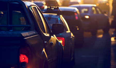 Urban traffic jam at the evening, sunlightの写真素材