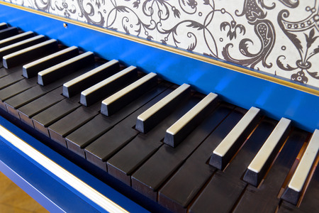 Detail of old harpsichord keyboard with black keys, close-up viewの写真素材