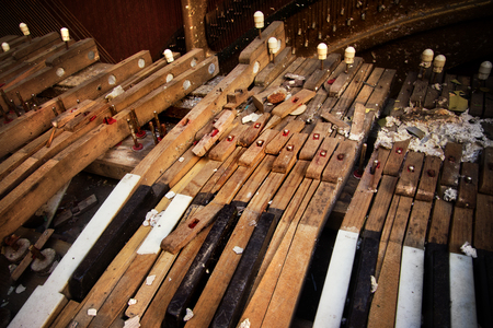 Keyboard of old broken piano (close-up view)の写真素材
