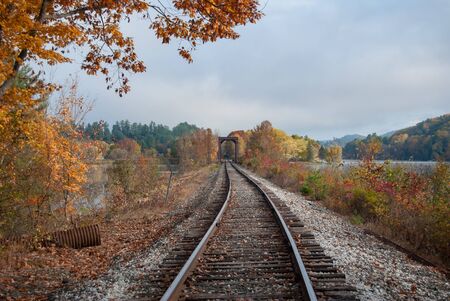 Railroad Tracks Over the Connecticut River with an Old Iron Bridgeの写真素材