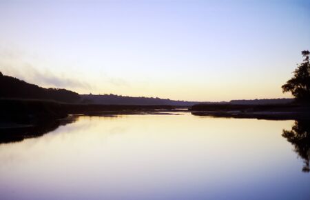 Horizon with a Reflected Sky at Sunriseの写真素材