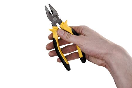 Pliers in the hand isolated over white background