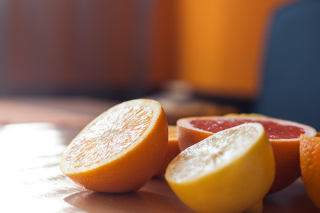 Pile of citruses cut in half and ready for squeezingの写真素材