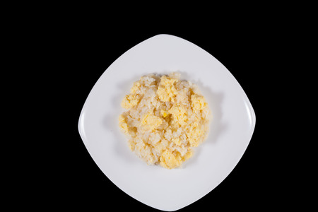 Rice with egg on black isolate, concept of healthy foodの写真素材