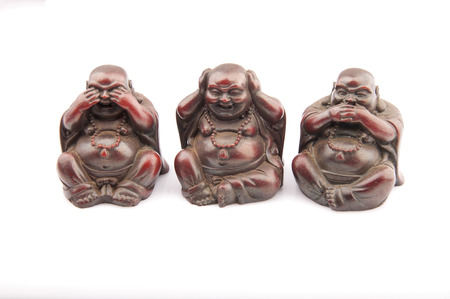 three Buddhas on white backgroundの写真素材