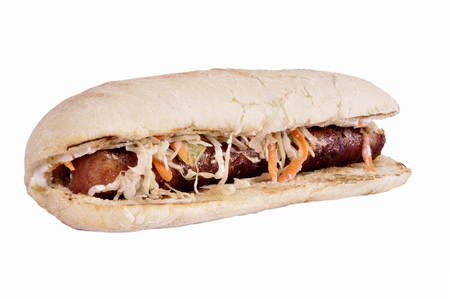 Burger with sausage in with a long bun isolated on white backgroundの写真素材