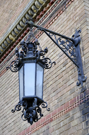 decorative lantern on an old brick buildingの写真素材