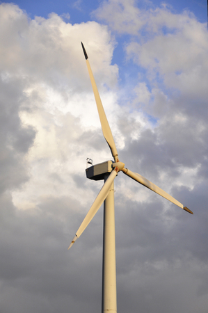 Wind turbine in the field producing energyの写真素材