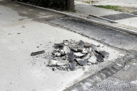 repair of a sidewalk with a pile of waste.の写真素材