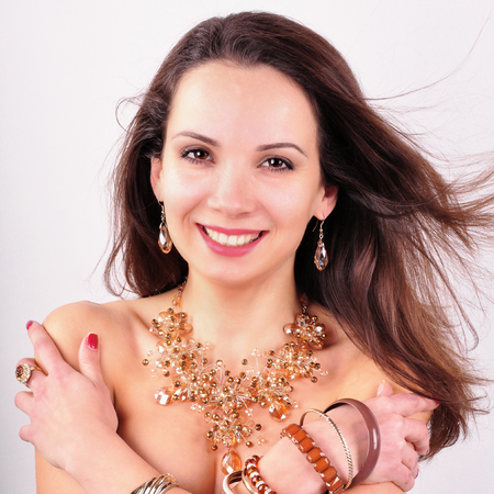 young beautiful fashion woman with jewelry accessoriesの写真素材
