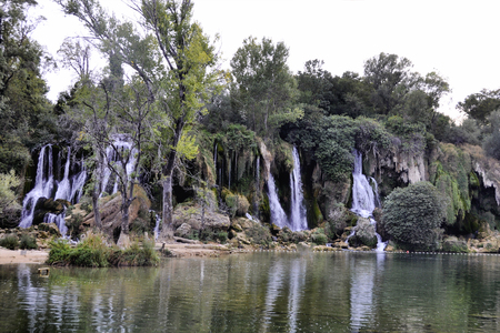 Beautiful Kravica waterfall in Bosnia and Herzegovina - popular swimming and picnic area for touristsの写真素材