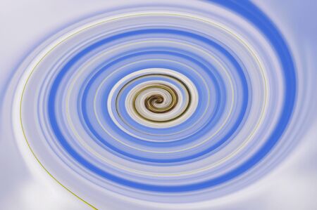 Illustration, blue spiralling burst from centre. Suitable for use as a background or textureの写真素材