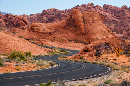 A road runs through it in the Valley of Fire State Park, Nevada, USAの写真素材