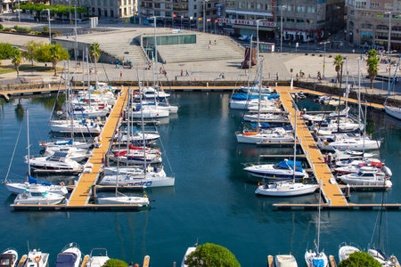 Vigo, Spain - September 8, 2018: Cityscape of Vigo with moored yachts, Port of Vigo, Galicia, Spainのeditorial素材