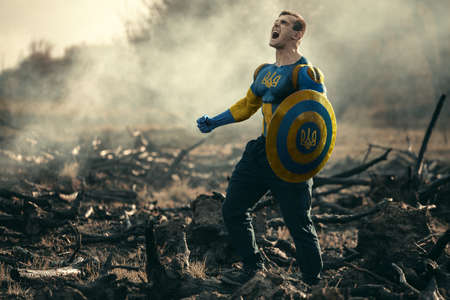 Man dressed as Ukrainian warrior. Captain Ukraine cosplay costume