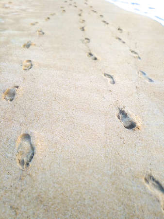 Footprints In The Sand On Beach In Thailand.の写真素材