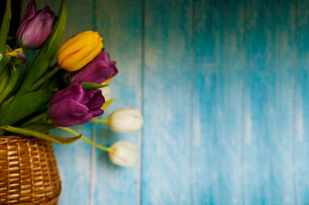 A Bouquet Of Fresh, Bright, Multi-Colored Tulips On Table.の写真素材