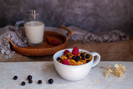 Bowl Of Cereal Flakes With Berries And Milk For Breakfast.
