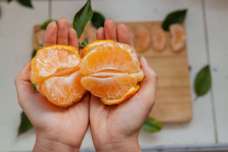 Close Up View Of Fresh Mandarins On Tableの写真素材