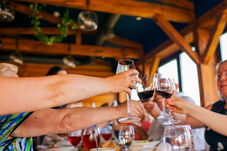 luxury banquet table setting in restaurant close-up. Plates and dishes on dining table in big hall.の写真素材