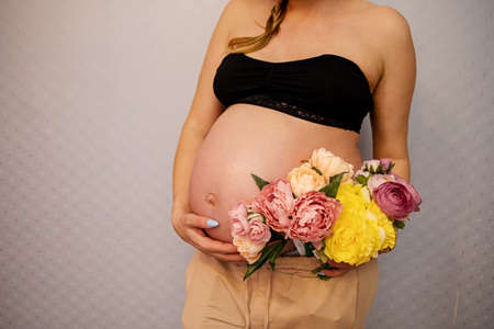 Close-up Pregnant Woman On White Backgroundの写真素材