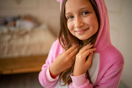 Cute child in Comfortable Soft Pajamas. Good Morning. Girl In Bunny Pajamas.の写真素材