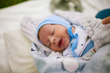 closeup of cute newborn baby, one month.