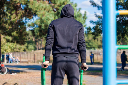 Sport guy spending time outdoors and expressing positive emotions