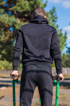 Sport guy spending time outdoors and expressing positive emotionsの写真素材