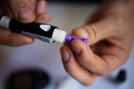 Man Make Blood Sugar Diabetes Test With Tester