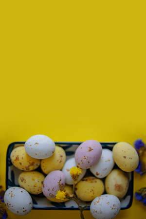 Composition With Beautiful Easter Eggs On Colored Background.