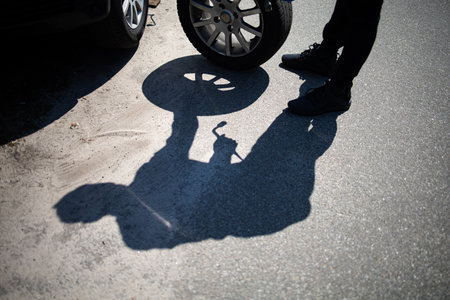 Part Of The Process Of Changing Wheels On A Carの写真素材