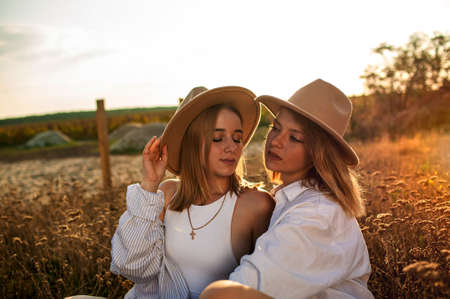 Girlfriends Or Sisters Having Fun Outdoor. Cute Positive Portrait Of Best Friend Pretty Youngの写真素材