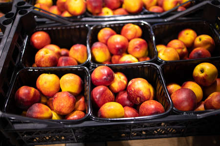 Lots Of Delicious Ripe Sweet Peaches For Food In Supermarket.の写真素材