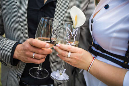 Hands Of A Newly-Married Couple With Wedding Ringsの写真素材