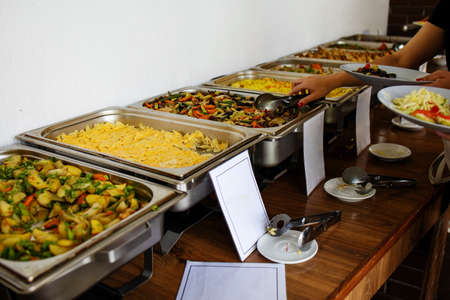 Hotel Breakfast Board In A Family Hotel. Buffet With Different Dishes.