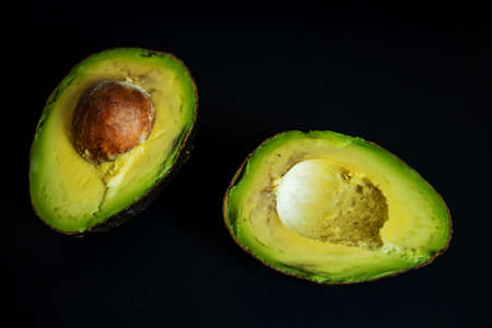 View Of An Avocado On Black Background.