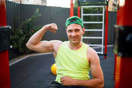 Strong Sport Man Is Training Outdoor City