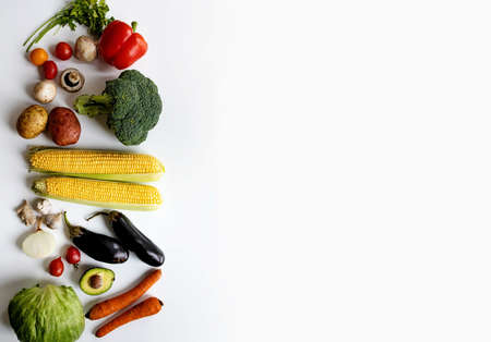 Healthy food background. Healthy vegan vegetarian food on white, copy space, banner. Shopping food supermarket and clean vegan eating concept.の写真素材