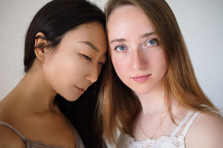 Multi-ethnic beauty. Different ethnicity women Caucasian and Asian.の写真素材