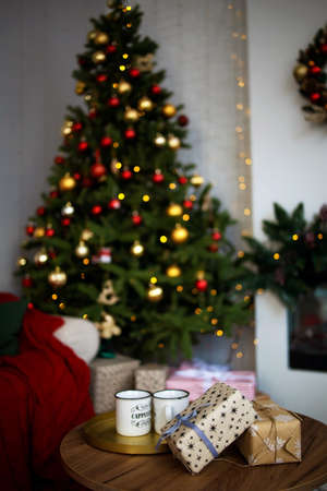 interior christmas. magic glowing tree and gifts.の写真素材