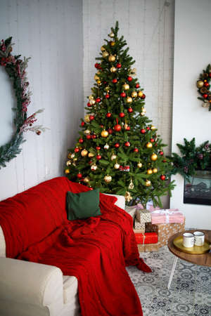 interior christmas. magic glowing tree and gifts.の写真素材