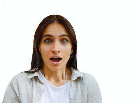 Close-up portrait of nice attractive lovely lovable pretty cute charming girlish funny unsure brown-haired girl looking at camera isolated on white background.の写真素材