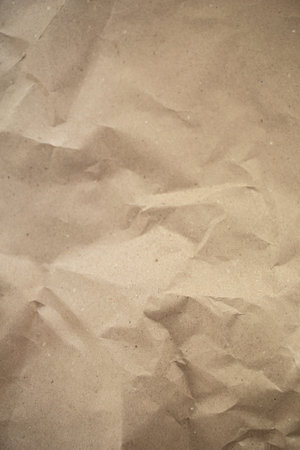 crumpled paper texture. Abstract brown recycled crumpled paper for background: crease of brown paper texture backgrounds for design, decorative. paper texture concept.の写真素材