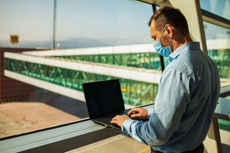 Passenger businessman wear masks disease prevention and Teleconference with laptop while traveling...