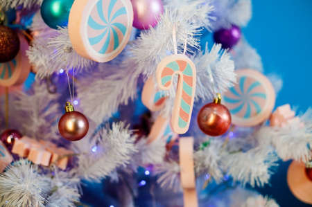 Christmas tree decorated with toys close-up.の写真素材