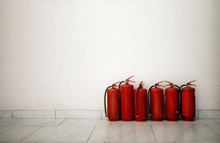 Fire extinguisher system on the wall background, powerful emergency equipment for industrial.の写真素材