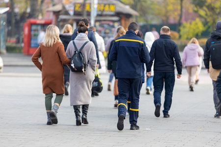 people walk along the street in Kyiv of Ukraine in the morning.の写真素材