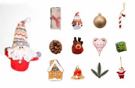 christmas composition. Christmas gifts, pine branches, toys on a white background. The apartment lay, view from above.の写真素材