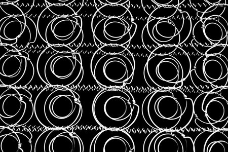 Block springs for mattresses isolated on black background.